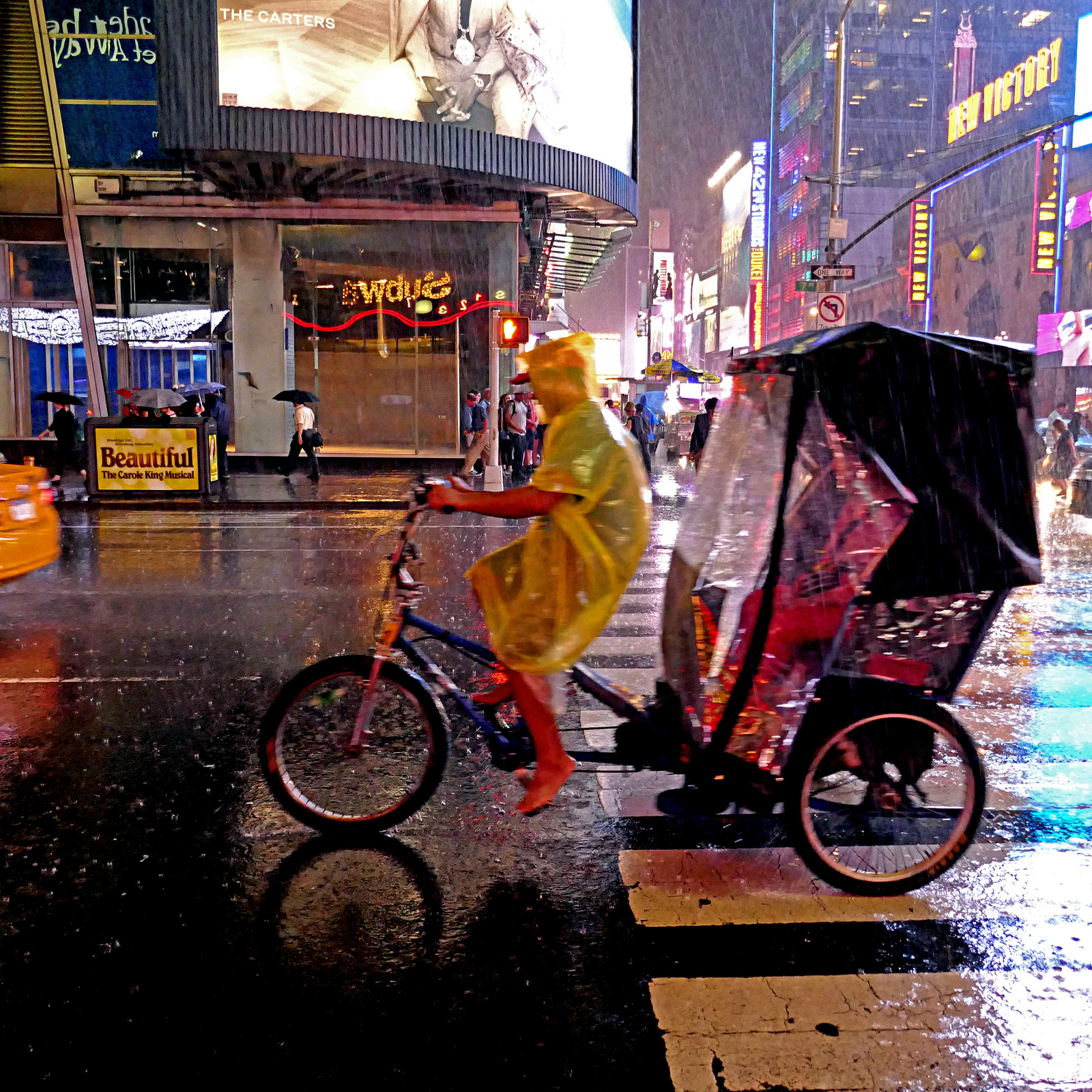cyclist rain street